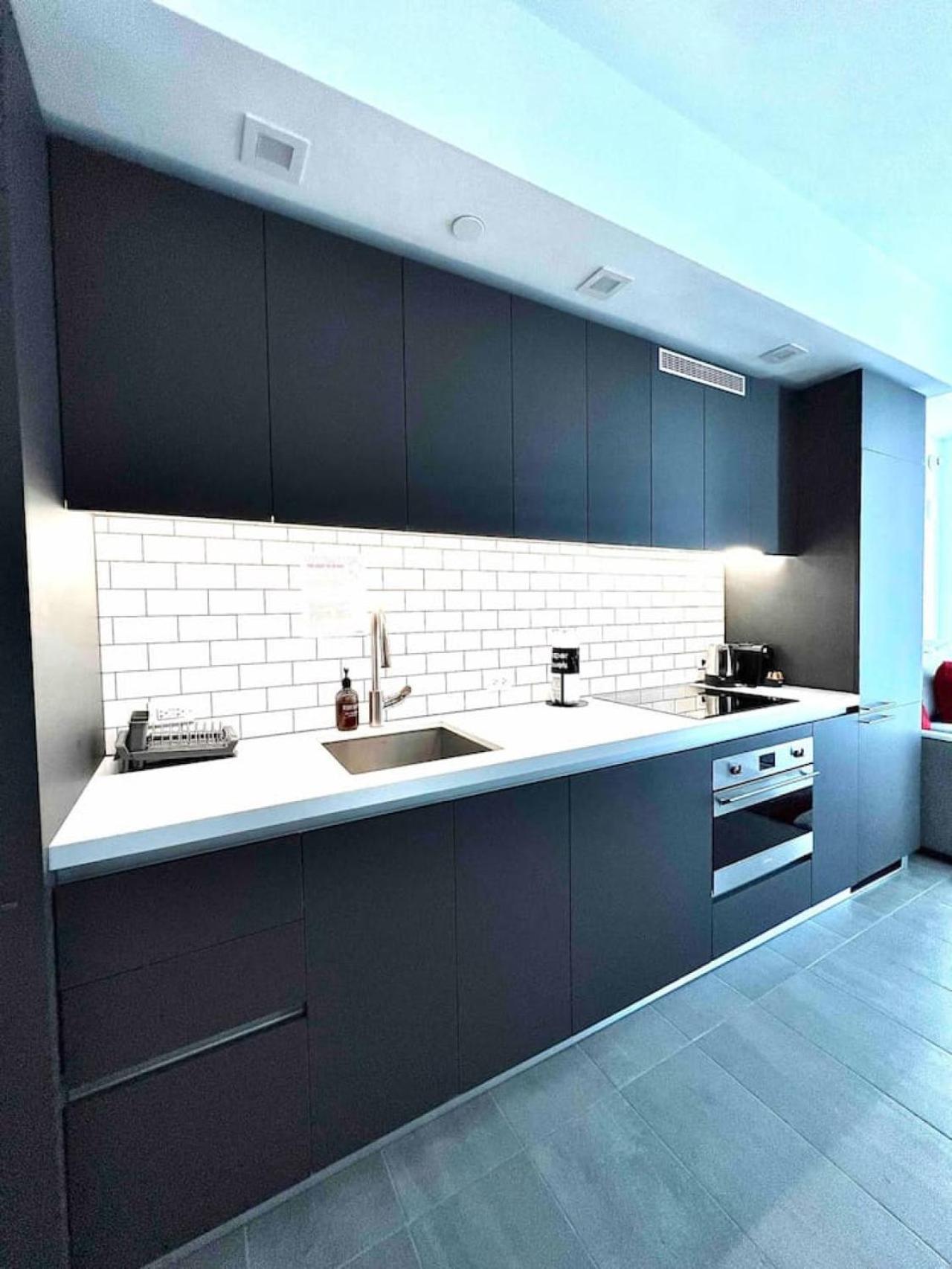 Holiday home Modern Downtown With Pool And Gym